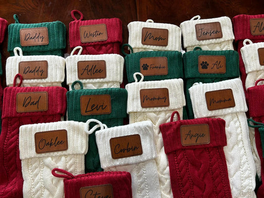 Cable knit Christmas stockings with personalized leather patch