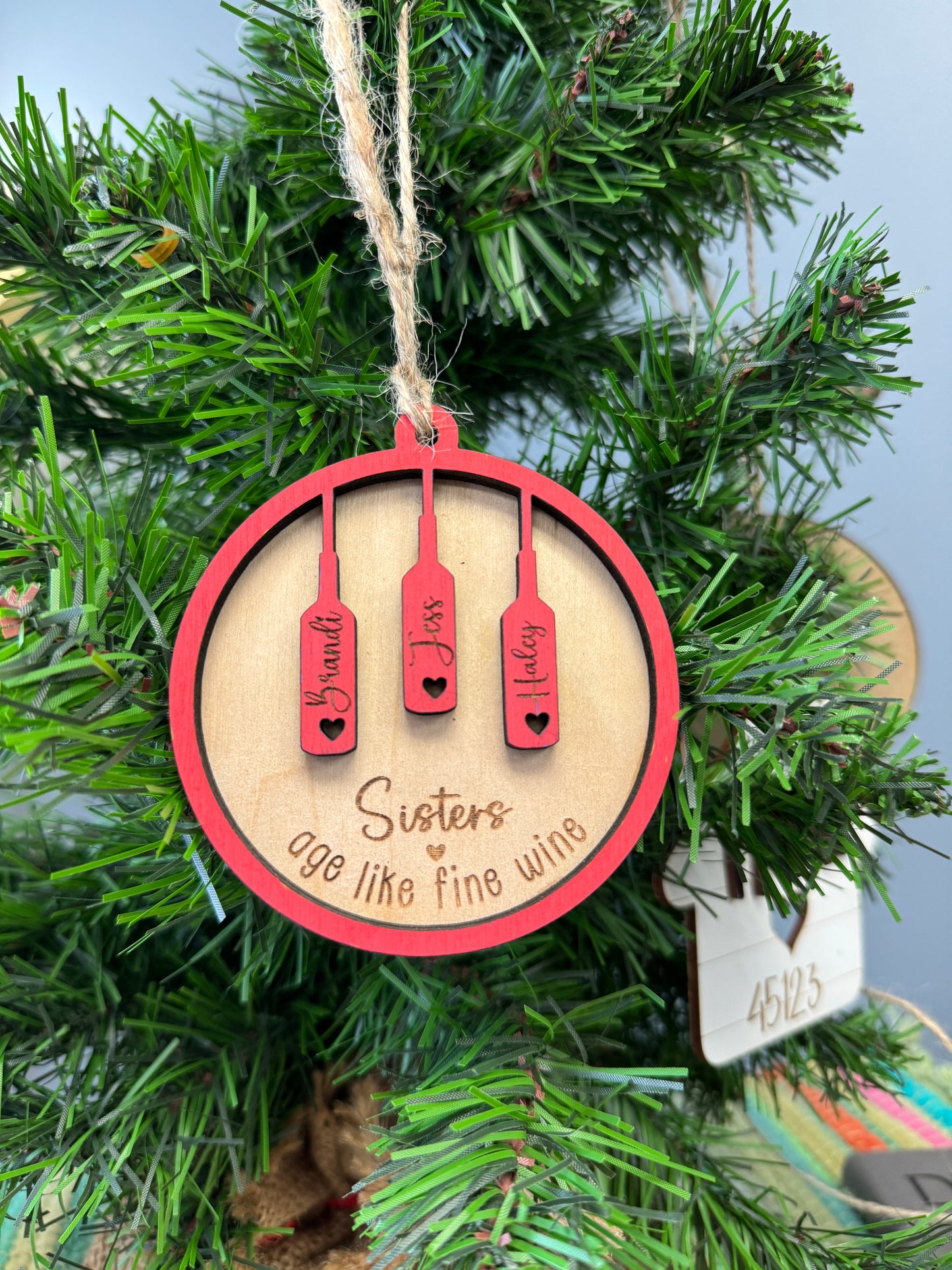 Sisters age like fine wine ornament