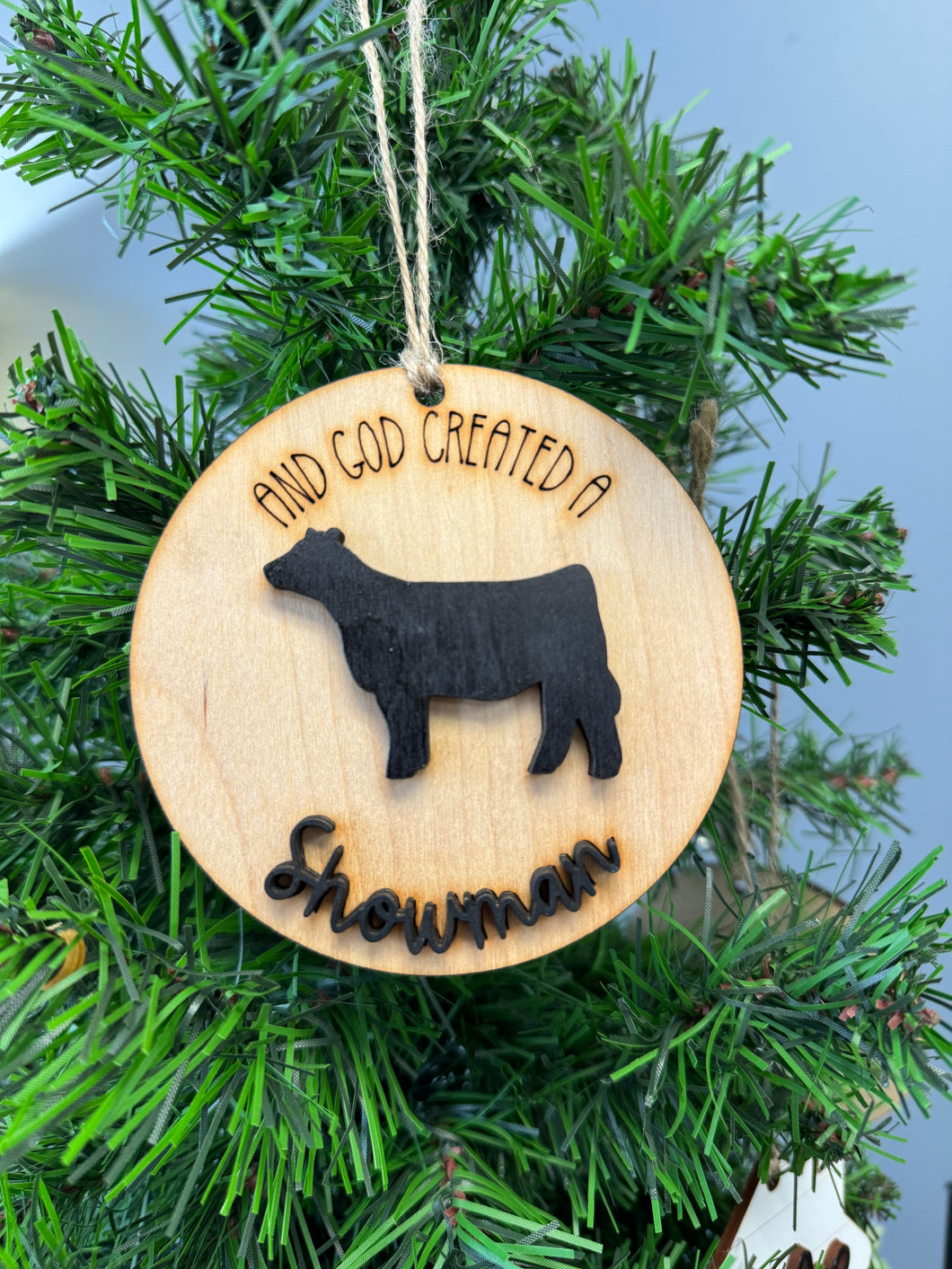 And God created a showman (steer) ornament