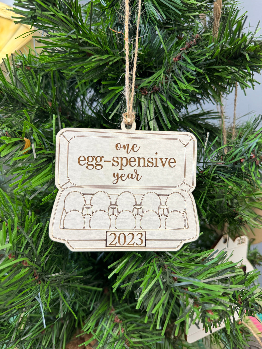 One egg-spensive year ornament